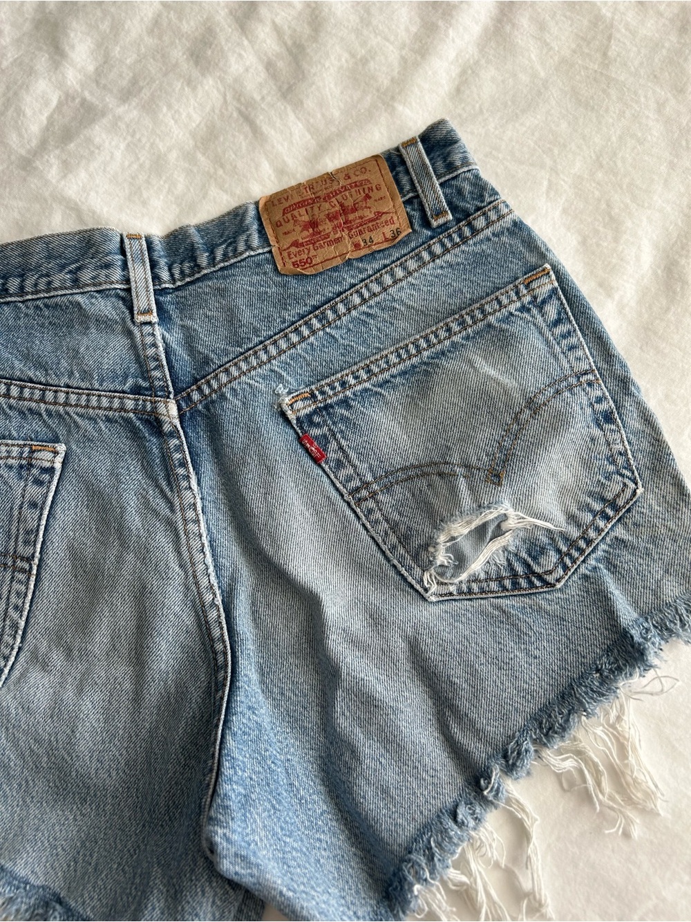 Levi's 550s Light Wash Distressed Denim Cutoff Shorts - Picture 2 of 15